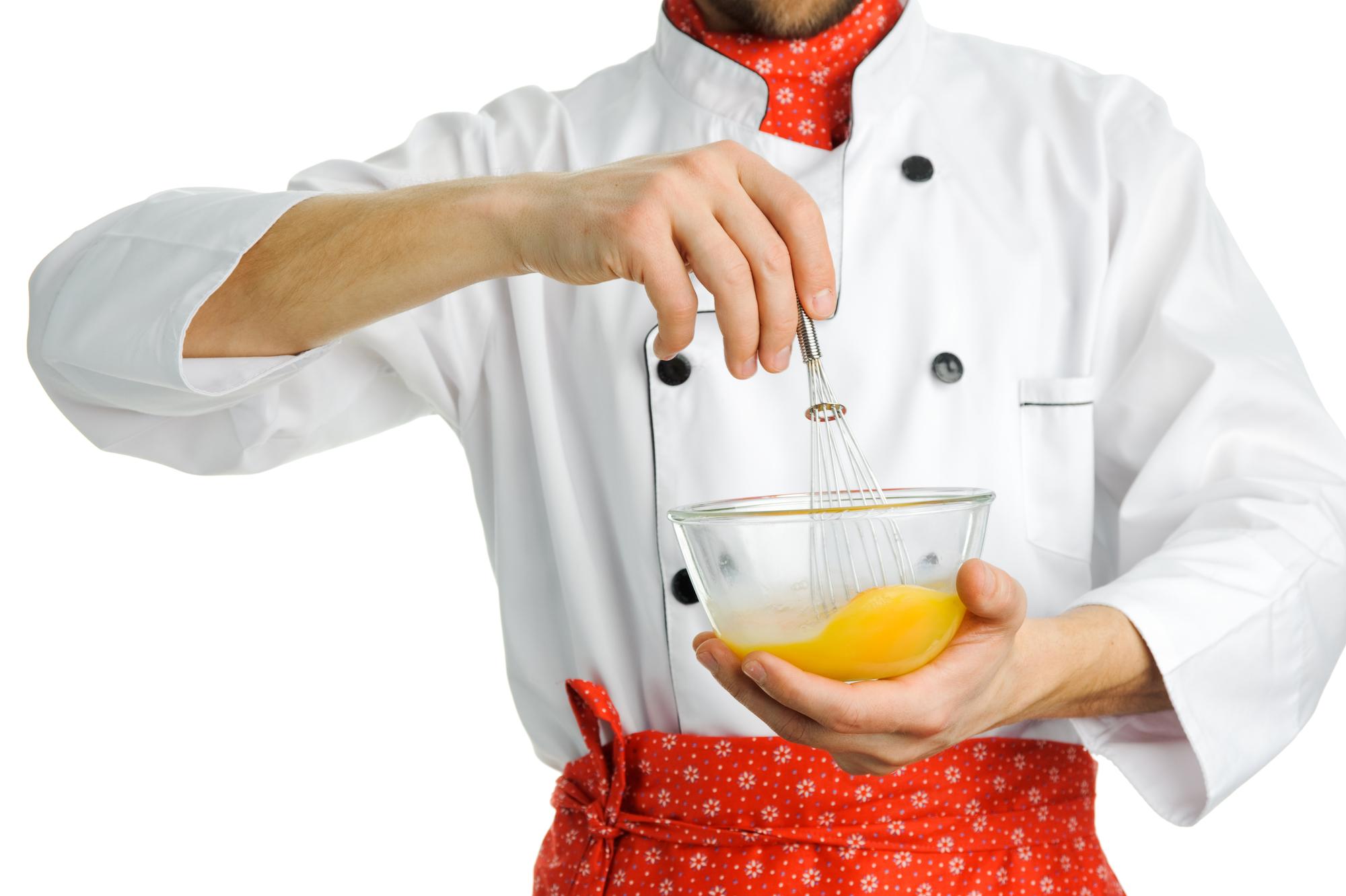 Chef demonstrating precision plating